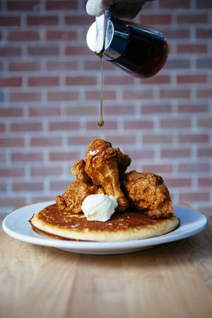 The Jim Morrison, a buttermilk pancake topped with fried chicken served at Brooklyn Bowl.