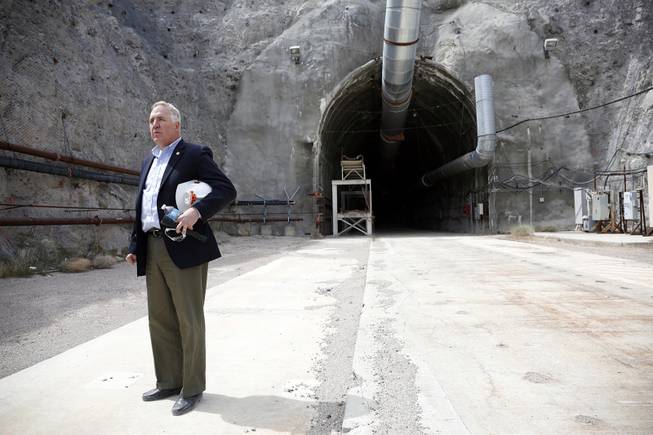 Rep. John Shimkus, R-Ill., stands near the north portal of Yucca Mountain during a congressional tour Thursday, April 9, 2015, about 90 miles northwest of Las Vegas.