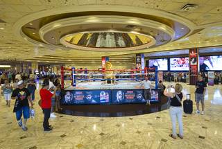 People take photos of a boxing ring in the MGM Grand Monday, April 20, 2015. Floyd Mayweather Jr. and Manny Pacquiao will fight at the MGM Grand Garden Arena on Saturday, May 2.  ..