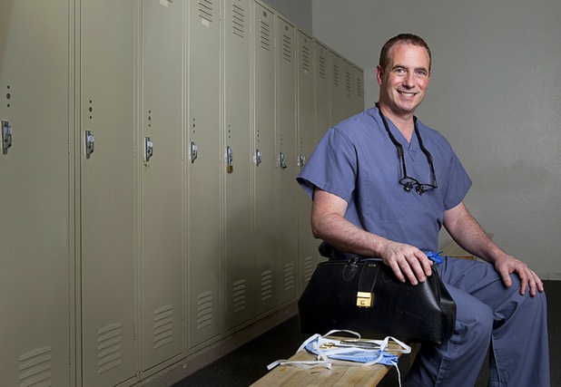 Plastic surgeon Dr. Jeffrey Roth, of Las Vegas Plastic Surgery Inc., poses in Top Rank Gym Tuesday, April 21, 2015. Roth uses his skills to take care of fighters who suffer injuries during boxing matches.   ..