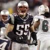 In this Dec. 23, 2007, file photo, New England Patriots linebacker Junior Seau (55) reacts after a defensive play during an NFL football game against the Miami Dolphins in Foxborough, Mass. A federal judge has approved Wednesday, April 22, 2015, a plan to resolve thousands of NFL concussion lawsuits that could cost the league $1 billion over 65 years. About 200 NFL retirees or their families, including Seau's, have rejected the settlement and plan to sue the league individually.