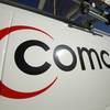 This Feb. 11, 2011, file photo shows the Comcast logo on one of the company's vehicles in Pittsburgh.