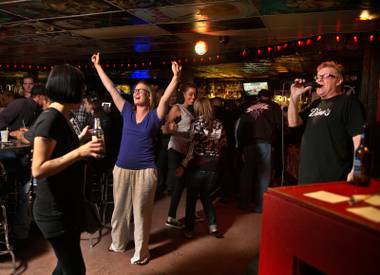 Longtime karaoke jockey Daniel Gobel, aka Danny G., delights patrons at Dino’s Lounge, Saturday, April 25, 2015. Gobel’s final day at Dino’s is Oct. 27.