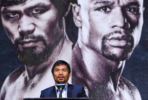 WBO welterweight champion Manny Pacquiao of the Philippines speaks during a final news conference at the MGM Grand Wednesday, April 29, 2015. Pacquiao will face undefeated WBC/WBA welterweight champion Floyd Mayweather Jr. of the U.S. in a welterweight unification bout at the MGM Grand Garden Arena Saturday.