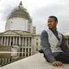 Abraham Tesfahun, 21, who works in food service at the Senate and makes $10.70 an hour, poses for a portrait at the Capitol in Washington on Friday, May 1, 2015.