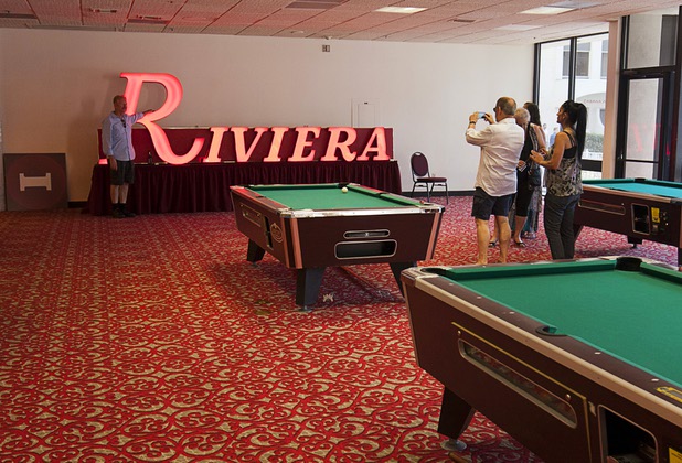 2:20 p.m. - People take photos in front of a Riviera sign at the Riviera Sunday, May 3, 2015.  STEVE MARCUS