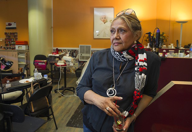 3:48 p.m. - Nail technician Ana Marx takes a break from packing at the Zeba's Beauty Salon in the Riviera Sunday, May 3, 2015.  STEVE MARCUS