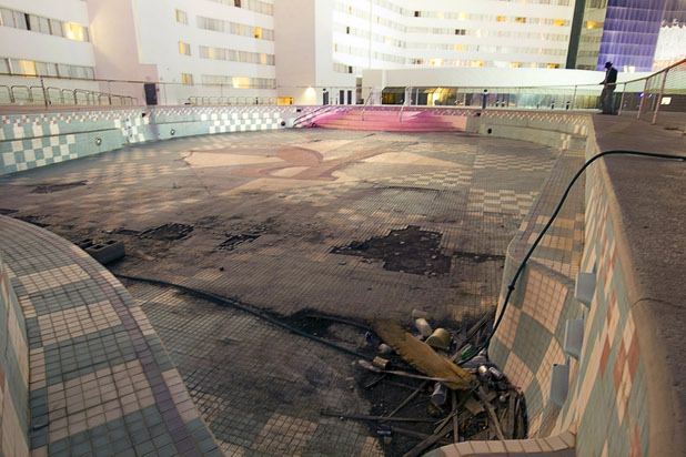 11:44 p.m. - A view of the abandoned pool over the casino floor at the Riviera Sunday, May 3, 2015. The pool was added in the 1980's but it leaked into the casino and was never properly repaired.