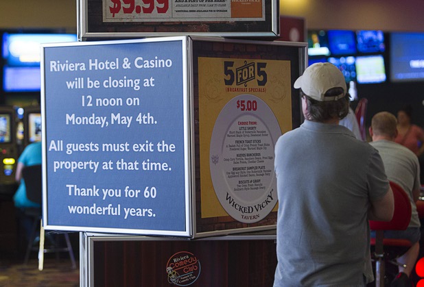 11:18 a.m. - A man looks over signage in the casino at the Riviera Monday, May 4, 2015.  STEVE MARCUS