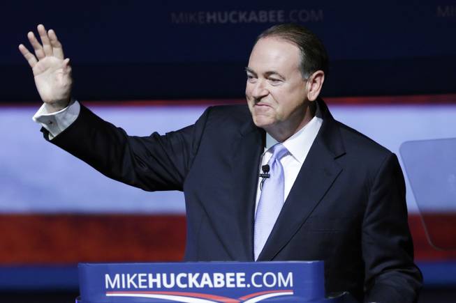 Former Arkansas Gov. Mike Huckabee waves to supporters in Hope, Ark., Tuesday, May 5, 2015, after he announced that he is running for the Republican presidential nomination.