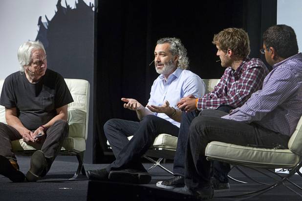 Panelists speak on "Brand Meets Performance" during the Collision technology conference at the World Market Center Pavilions Wednesday, May 6, 2015. From left: moderator Spencer Reiss, AdRoll CEO Aaron Bell, Jack Krawczyk, vice president of product at Pandora, and Ashu Garg, general partner at Foundation Capital.