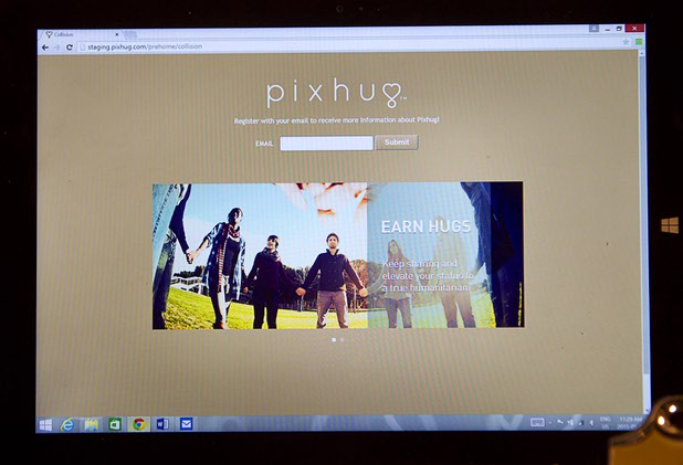A view of the Pixhug website during the Collision technology conference at the World Market Center Pavilions Wednesday, May 6, 2015. The App partners with corporations that donate $1.00 to a selected charity when someone "likes" the photo on social media.