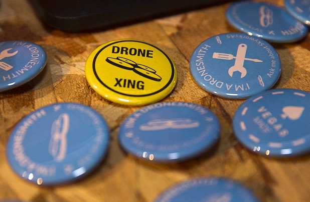 Buttons are displayed at the Skyworks Aerial Systems booth during the Collision technology conference at the World Market Center Pavilions Wednesday, May 6, 2015. The Henderson-company is introducing a new Quark-E drone, a low-cost, starter drone development kit.