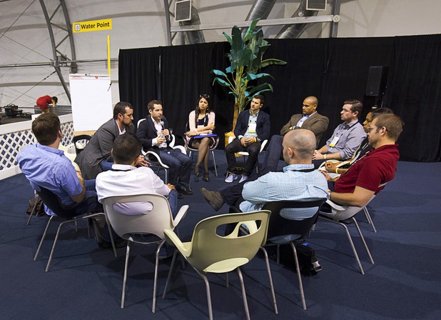 People attend a roundtable discussion during the Collision technology conference at the World Market Center Pavilions Wednesday, May 6, 2015.