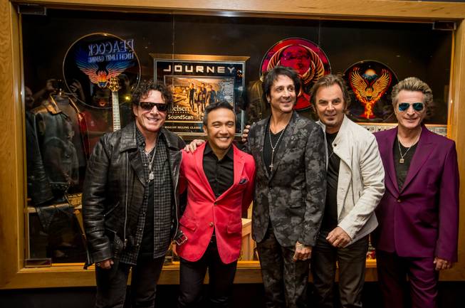 Neal Schon and Journey memorabilia cases are unveiled Wednesday, May 6, 2015, at the Hard Rock Hotel.