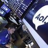 Specialist Ronnie Howard works at his post on the floor of the New York Stock Exchange, Tuesday, May 12, 2015. Verizon is buying AOL for about $4.4 billion, advancing the telecom's push in both mobile and advertising fields.