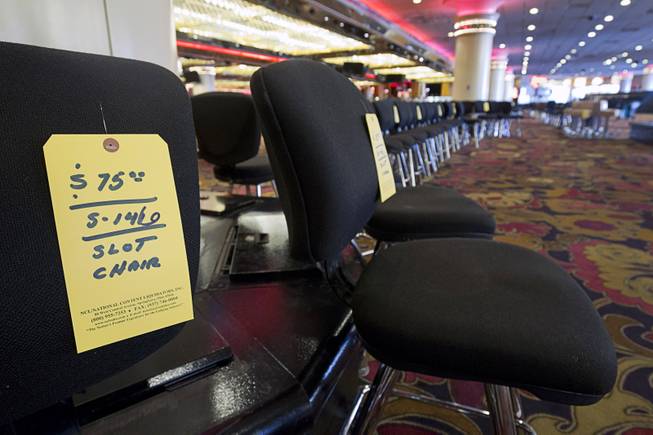 Slot chairs ($75 each) are shown during the first day of a liquidation sale at the Riviera on Thursday, May 14, 2015.