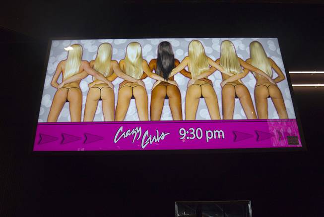 An illuminated "Crazy Girls" sign ($475) is shown during the first day of a liquidation sale Thursday, May 14, 2015, at the Riviera.