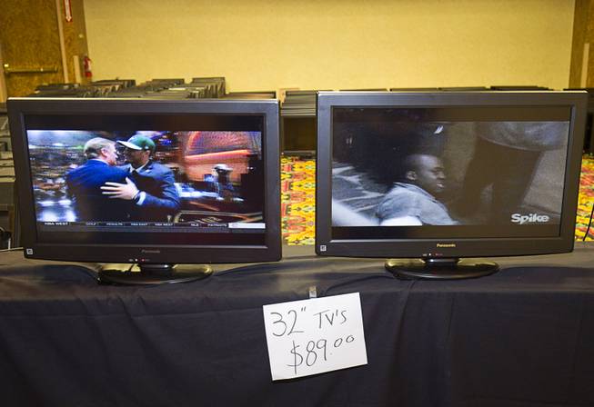 Flat panel televisions ($89.00) are shown during the first day of a liquidation sale at the Riviera Thursday, May 14, 2015.