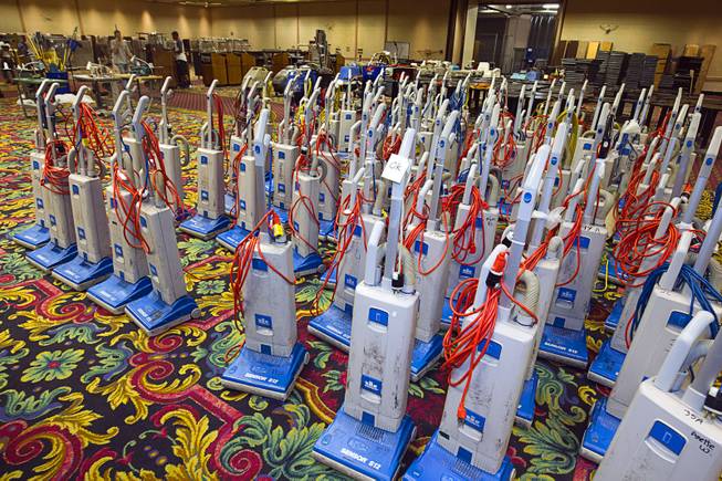 Vacuum cleaners ($75.00 each) are displayed in a convention center ballroom during the first day of a liquidation sale at the Riviera Thursday, May 14, 2015.