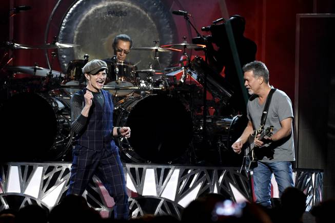 David Lee Roth, left, and Eddie Van Halen of Van Halen perform at the Billboard Music Awards at MGM Grand Garden Arena on Sunday, May 17, 2015, in Las Vegas.