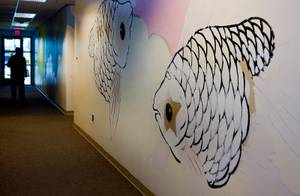 Parts of a mural in progress by painter Sush Machida on the walls at Child Haven on Tuesday, May 19, 2015.  L.E. Baskow
