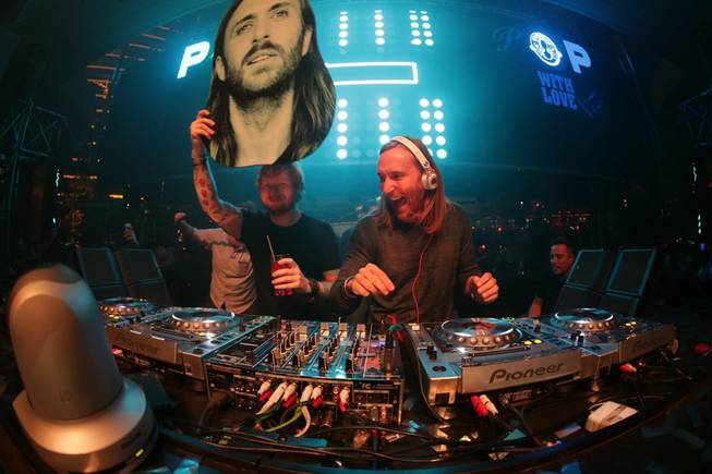 David Guetta, joined here by Ed Sheeran at left, spins ...