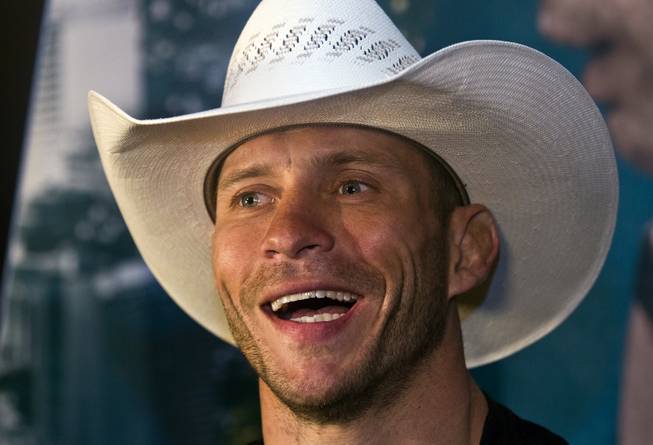 UFC  lightweight contender Donald Cerrone laughs at a reporter's question during the UFC187 media day  at the MGM Grand on Thursday, May 21, 2015.
