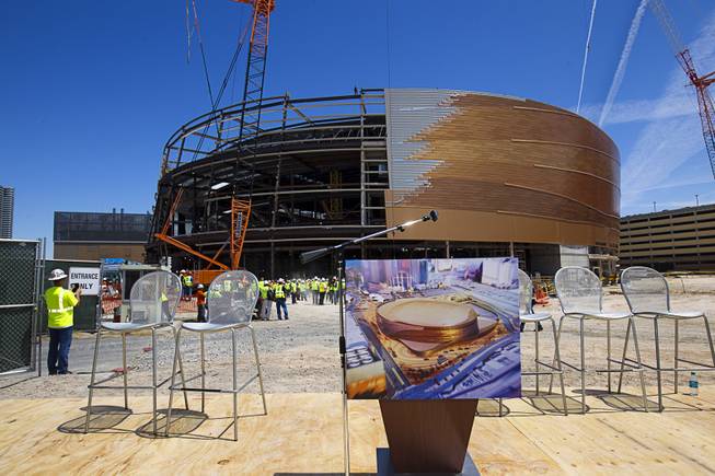 An artist's illustration of the completed arena is displayed during a topping off ceremony for the Las Vegas Arena Wednesday, May 27, 2015. Representatives from MGM Resorts International and AEG, contractors Hunt-Penta and elected officials were on hand to celebrate the installation of the arena's final steel beam. The $375 million arena is scheduled to open in Spring 2016.