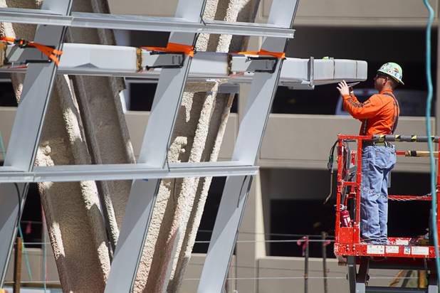 Work continues on the Las Vegas Arena before a topping off ceremony Wednesday, May 27, 2015. Representatives from MGM Resorts International and AEG, contractors Hunt-Penta and elected officials were on hand to celebrate the installation of the arena's final steel beam. The $375 million arena is scheduled to open in Spring 2016.