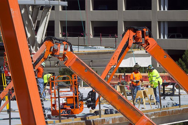 Work continues on the Las Vegas Arena before a topping off ceremony Wednesday, May 27, 2015. Representatives from MGM Resorts International and AEG, contractors Hunt-Penta and elected officials were on hand to celebrate the installation of the arena's final steel beam. The $375 million arena is scheduled to open in Spring 2016.