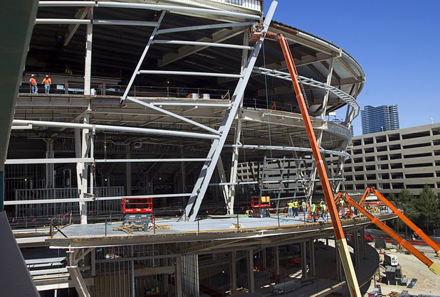 Work continues on the Las Vegas Arena before a topping off ceremony Wednesday, May 27, 2015. Representatives from MGM Resorts International and AEG, contractors Hunt-Penta and elected officials were on hand to celebrate the installation of the arena's final steel beam. The $375 million arena is scheduled to open in Spring 2016.