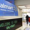 In this Feb. 17, 2009 file photo, shoppers leave a Wal-Mart in Danvers, Mass. Wal-Mart is raising starting wages for more than 100,000 U.S. department managers and workers in its deli and other specialized departments, the company said Monday, June 1, 2015. 