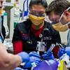 Nurse practitioner Francine Clegg puts in an airway in a patient in the University Medical Center ER on Friday, March 13, 2015, under the direction of attending physicians.