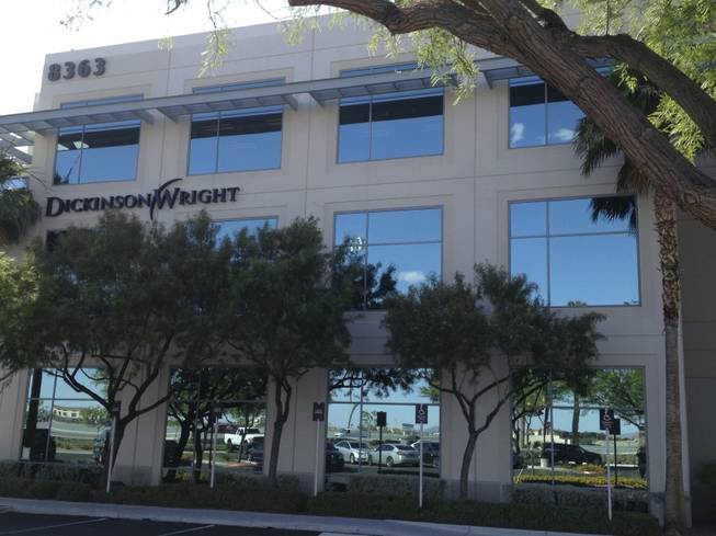 Law firm Dickinson Wright has hired 13 attorneys from Gordon Silver, a Las Vegas firm that's been hit with many resignation in recent months. Dickinson Wright's Las Vegas offices, 8363 W. Sunset Road, are pictured above on Friday, June 5, 2015.