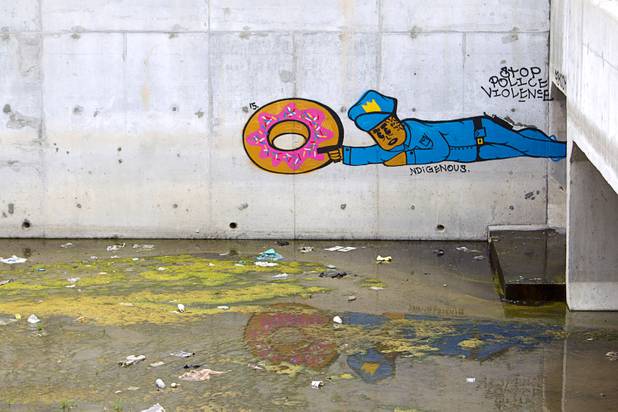 Graffiti is shown in the Las Vegas Wash channel near Pecos Road and Lake Mead Boulevard Tuesday, June 9, 2015.