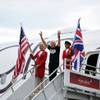 Sir Richard Branson, founder and president of Virgin Atlantic Airways, center, arrives with the flight crew of Virgin Atlantic's newest aircraft, a Boeing 787-9 named "Dream Jeannie," to celebrate a new Virgin Atlantic flight between London and Detroit, Thursday, June 11, 2015, at Detroit Metropolitan Airport in Romulus, Mich. 