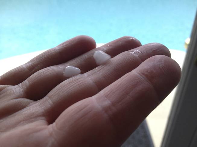 A thunderstorm produced rain and pea-sized hail as it blew through the central Las Vegas Valley on Sunday, June 14, 2015.
