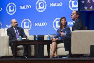 NALEO executive director Arturo Vargas, left, and former state assemblywoman Lucy Flores listen to David Damore, UNLV associate professor, during the National Association of Latino Elected and Appointed Officials (NALEO) 32nd annual conference at Aria Wednesday, June 17, 2015.