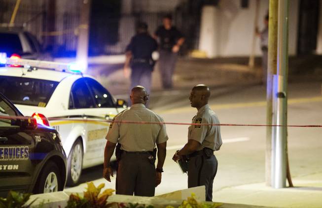 Police stand outside the Emanuel AME Church following a shooting Wednesday, June 17, 2015, in Charleston, S.C. 