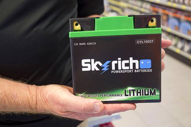 Dan Hughes holds a lightweight lithium motorcycle battery in the Batteries Plus Bulbs store, 2546 E Craig Road, in North Las Vegas Monday, June 22, 2015.