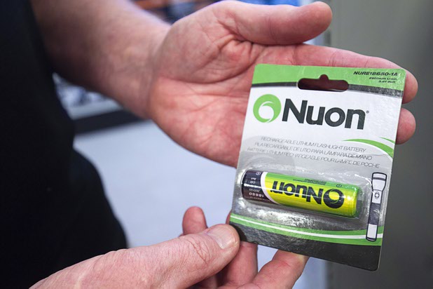 Dan Hughes holds a flashlight battery in the Batteries Plus Bulbs store, 2546 E Craig Road, in North Las Vegas Monday, June 22, 2015. Sales of the battery increased after manufacturers started using them in e-cigarettes, he said.