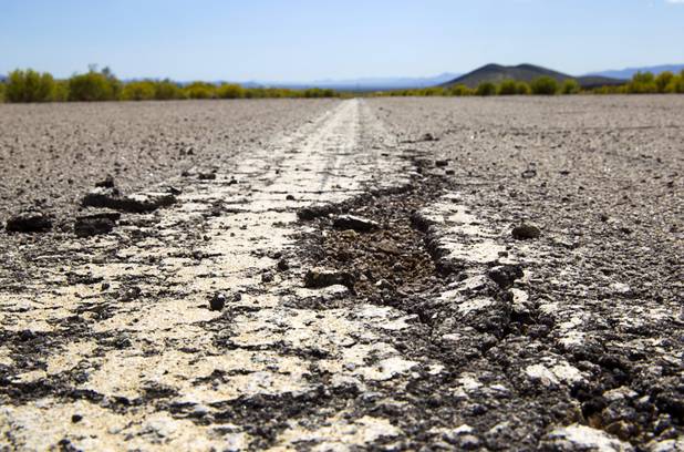 The runway at the Searchlight Airport is in disrepair in Searchlight on Sunday, Sept. 28, 2014.