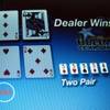 This Jan. 31, 2014, photo shows a game of Texas Hold 'Em under way on a computer screen in Atlantic City.