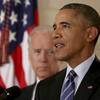 President Barack Obama, standing with Vice President Joe Biden, delivers remarks in the East Room of the White House in Washington, Tuesday, July 14, 2015, after an Iran deal is reached. 