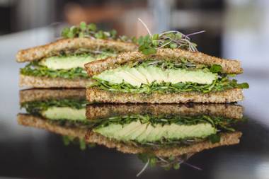 Avocado, arugula and walnut pesto all work in sync within one of these great sandwiches.