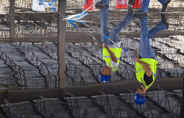 Workers are reflected in a concrete floor at the Ikea Las Vegas store at Durango Drive and Sunset Road Tuesday, July 28, 2015. The store is expected to open in the summer of 2016.
