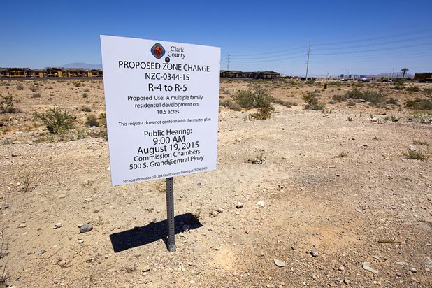 A sign posted just north of the Ikea Las Vegas construction site at Durango Drive and Sunset Road, gives notice of a proposed zoning change Tuesday, July 28, 2015.