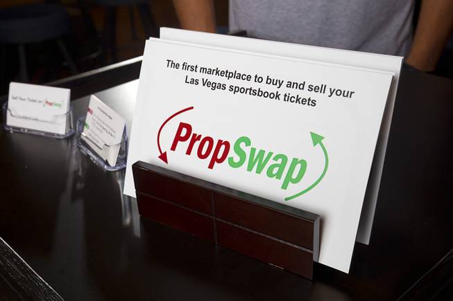 A sign is shown on a podium at The Sporting Life Bar, 7770 S. Jones Blvd., on Thursday, July 30, 2015, in Las Vegas. PropSwap is the first marketplace to buy and sell Nevada sports book tickets, said founders Ian Epstein and Luke Pergande.