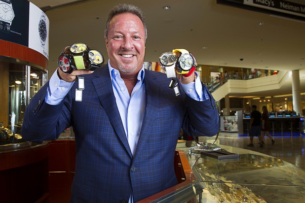 Stuart Berger, owner of Berger & Son Fine Jewelers, poses in the store at the Fashion Show Mall Monday Aug. 3, 2015.